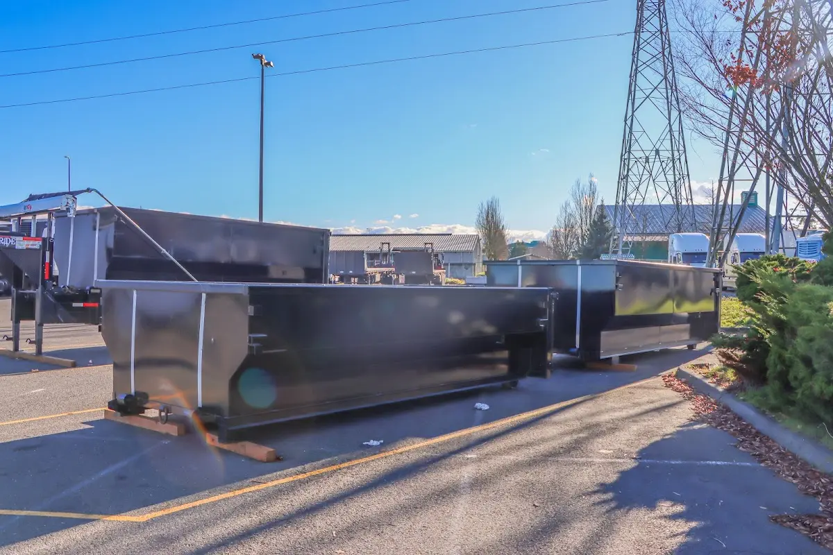 Roll-off dumpster ready for waste disposal at job site for Demolition Dumpster Rental in Raleigh